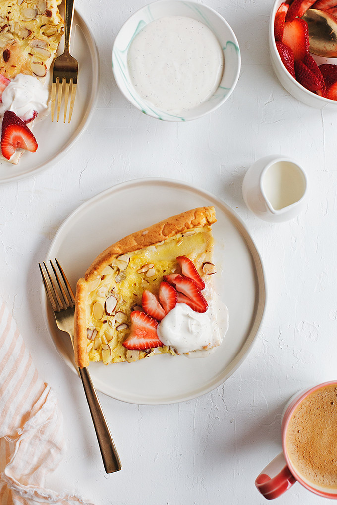 Almond Dutch Baby with Vanilla Bean Crème Fraîche and Strawberries